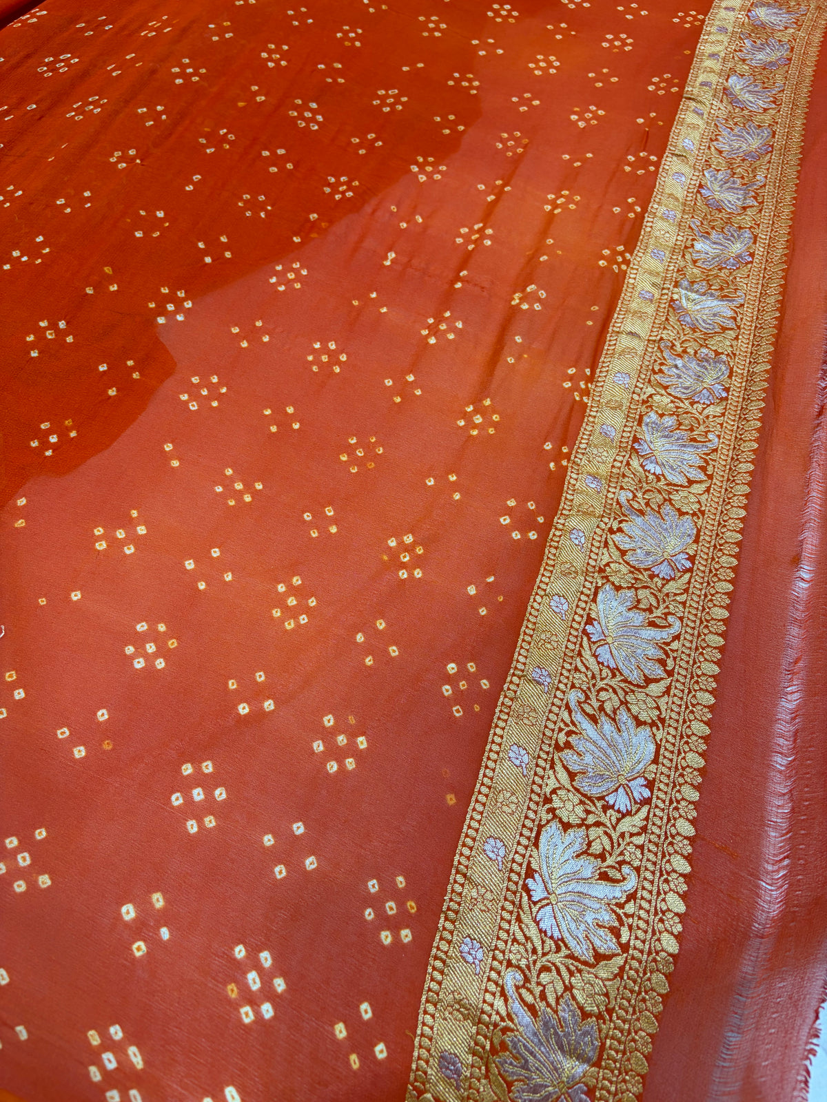 Pure georgette bandhani saree in rust orange