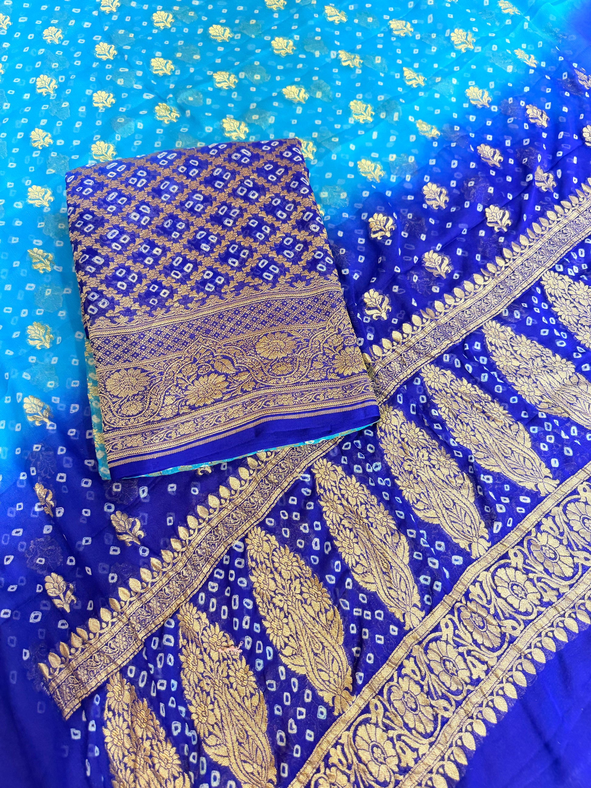 Pure georgette bandhani suit in Firozi with royal blue colour