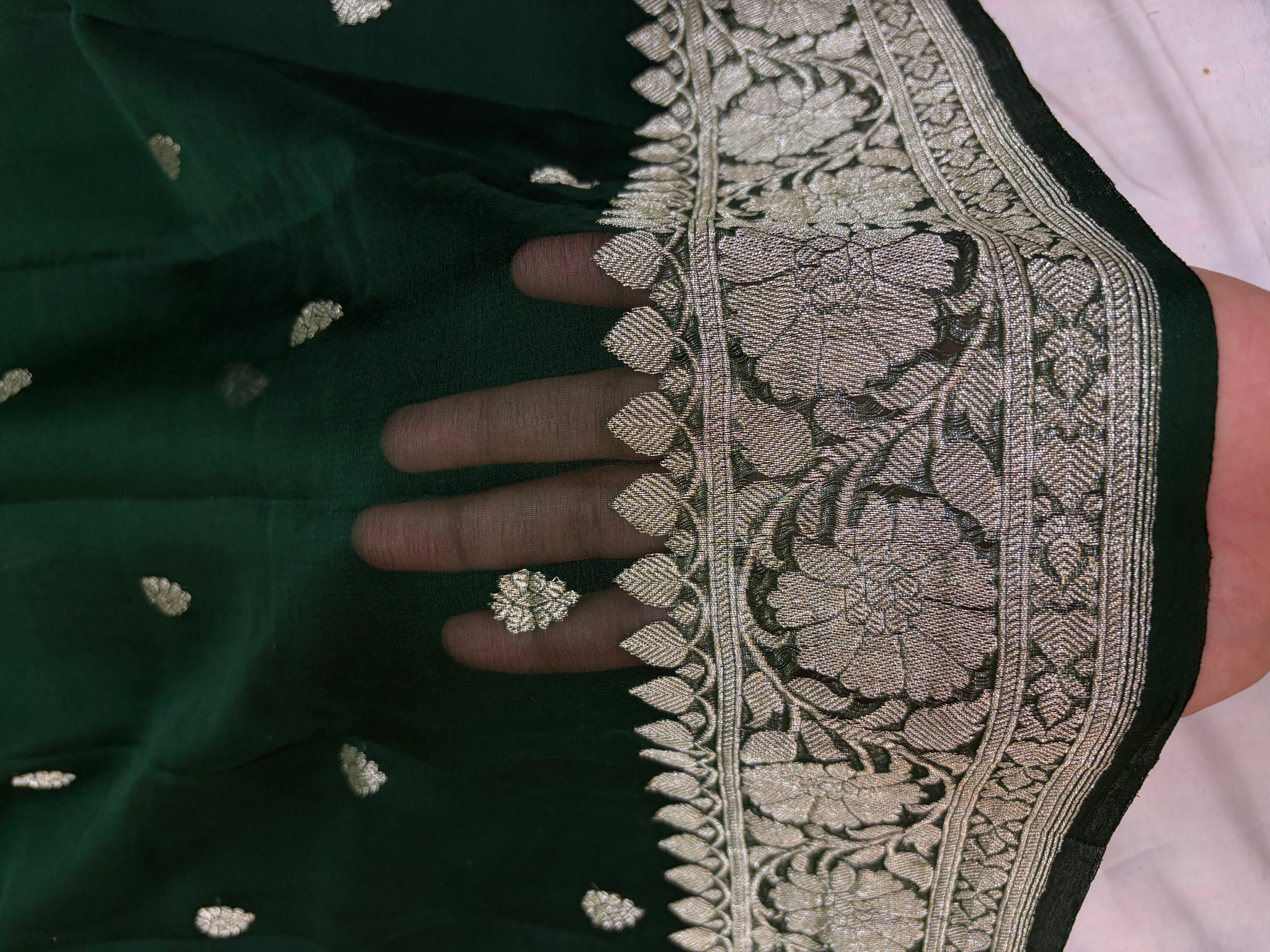 Pure Banarasi Khaddi Chiffon Zari Border Saree in bottle green colour