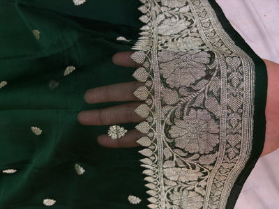 Pure Banarasi Khaddi Chiffon Zari Border Saree in bottle green colour