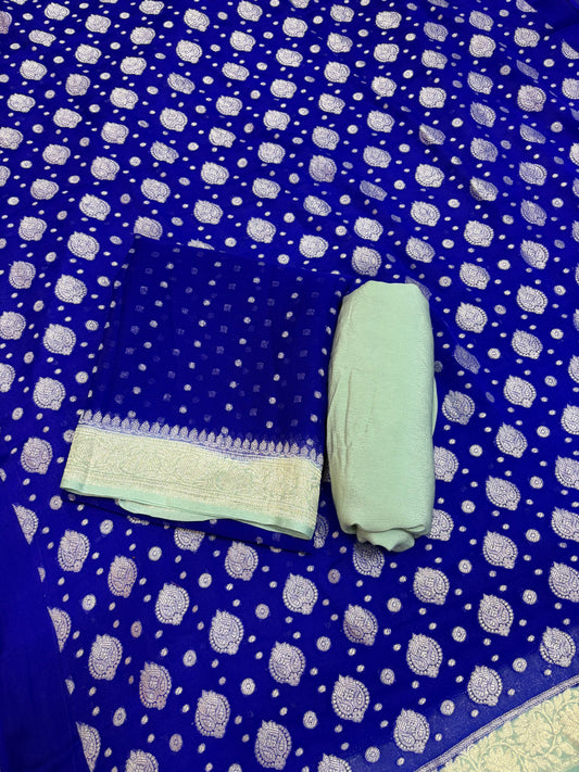 Pure khaddi chiffon suit in royal blue with sea green colour