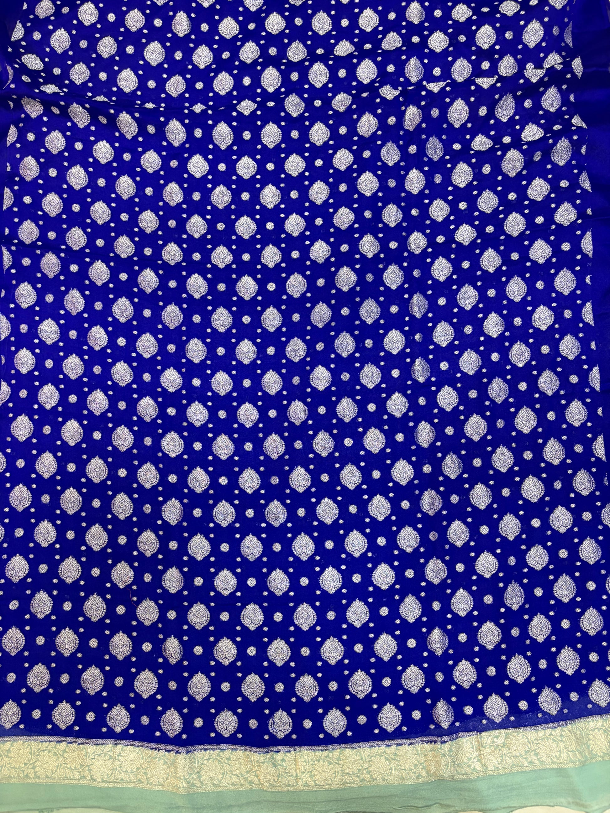 Pure khaddi chiffon suit in royal blue with sea green colour