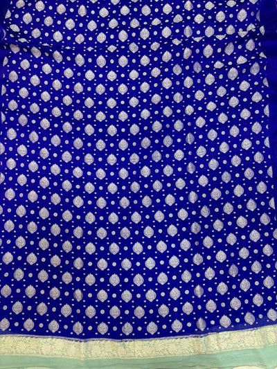Pure khaddi chiffon suit in royal blue with sea green colour