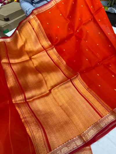Pure handloom organza silk saree In orange colour with red piping border