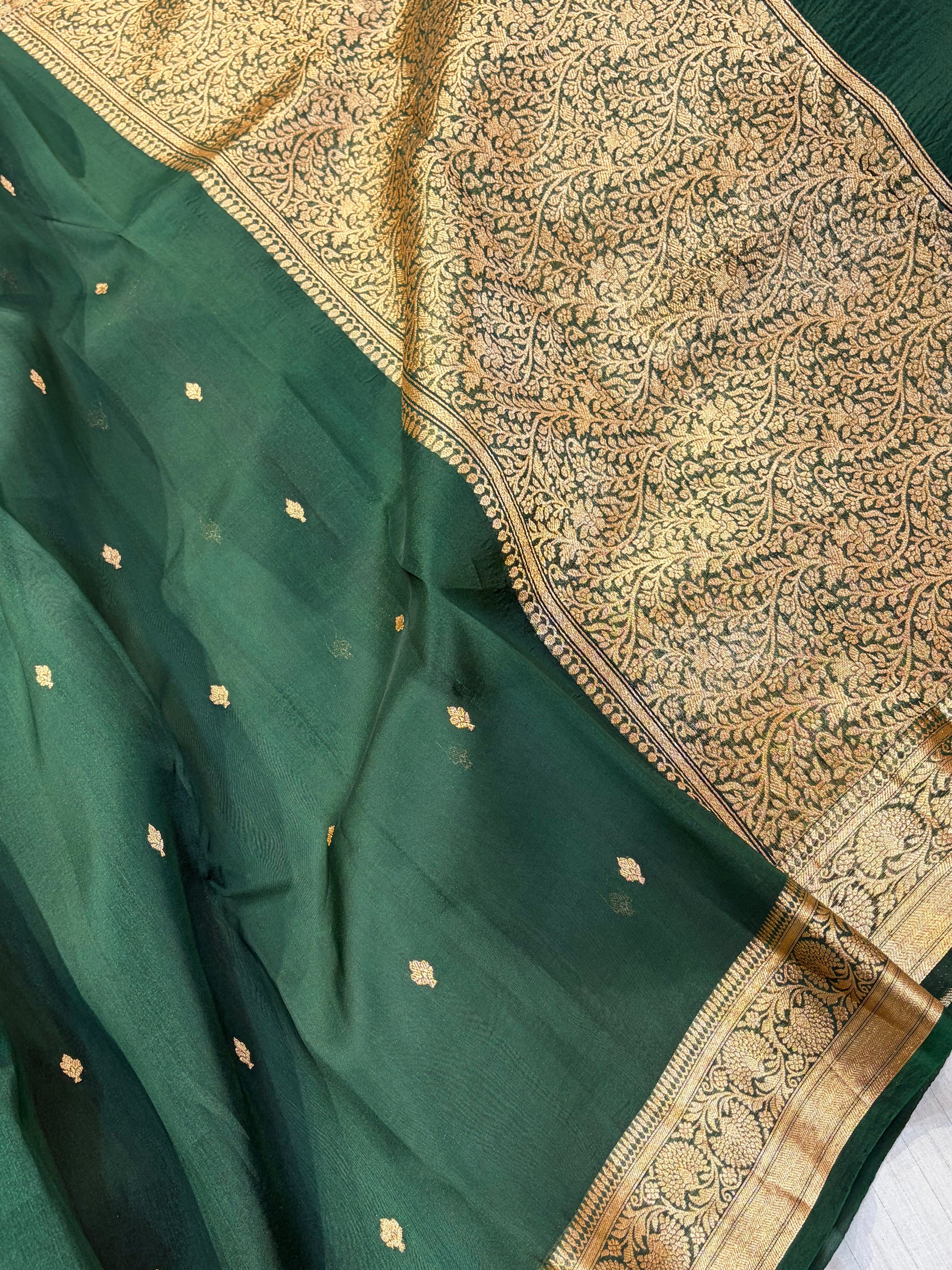 Pure handloom organza silk saree in bottle green colour