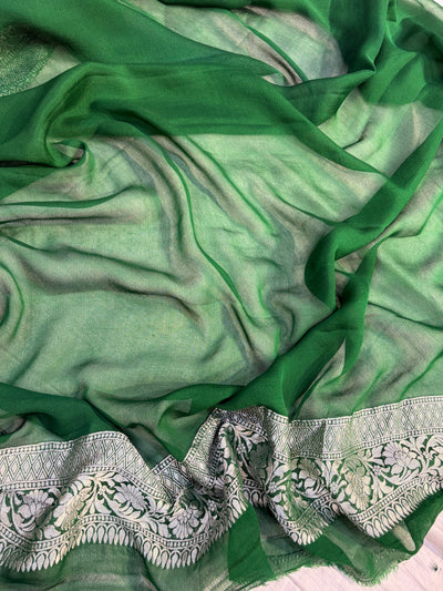 Pure georgette silk saree in temple design in a beautiful combination of Rani with bottle green colour
