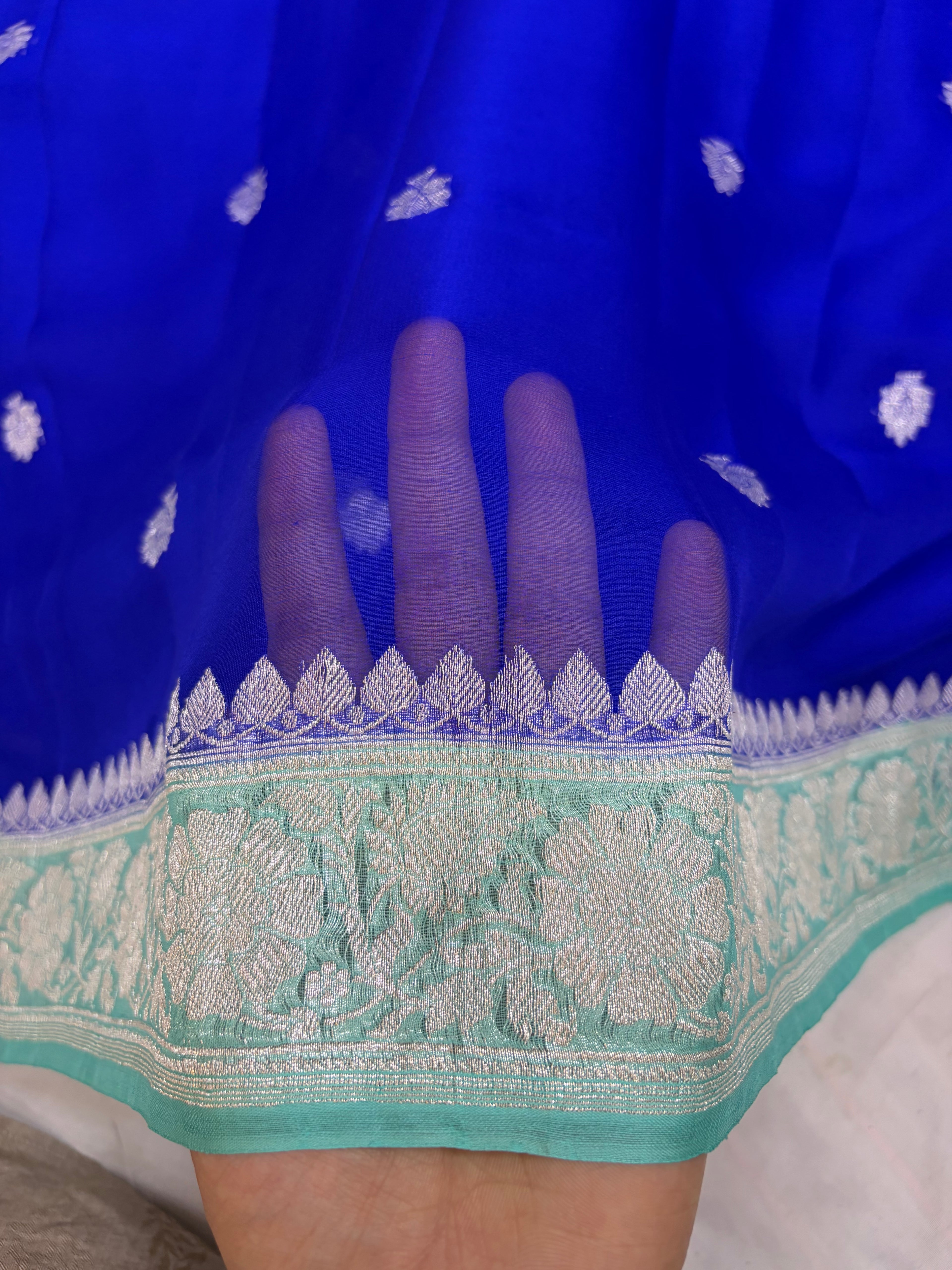 Pure khaddi chiffon saree in Royal blue and sea green colour