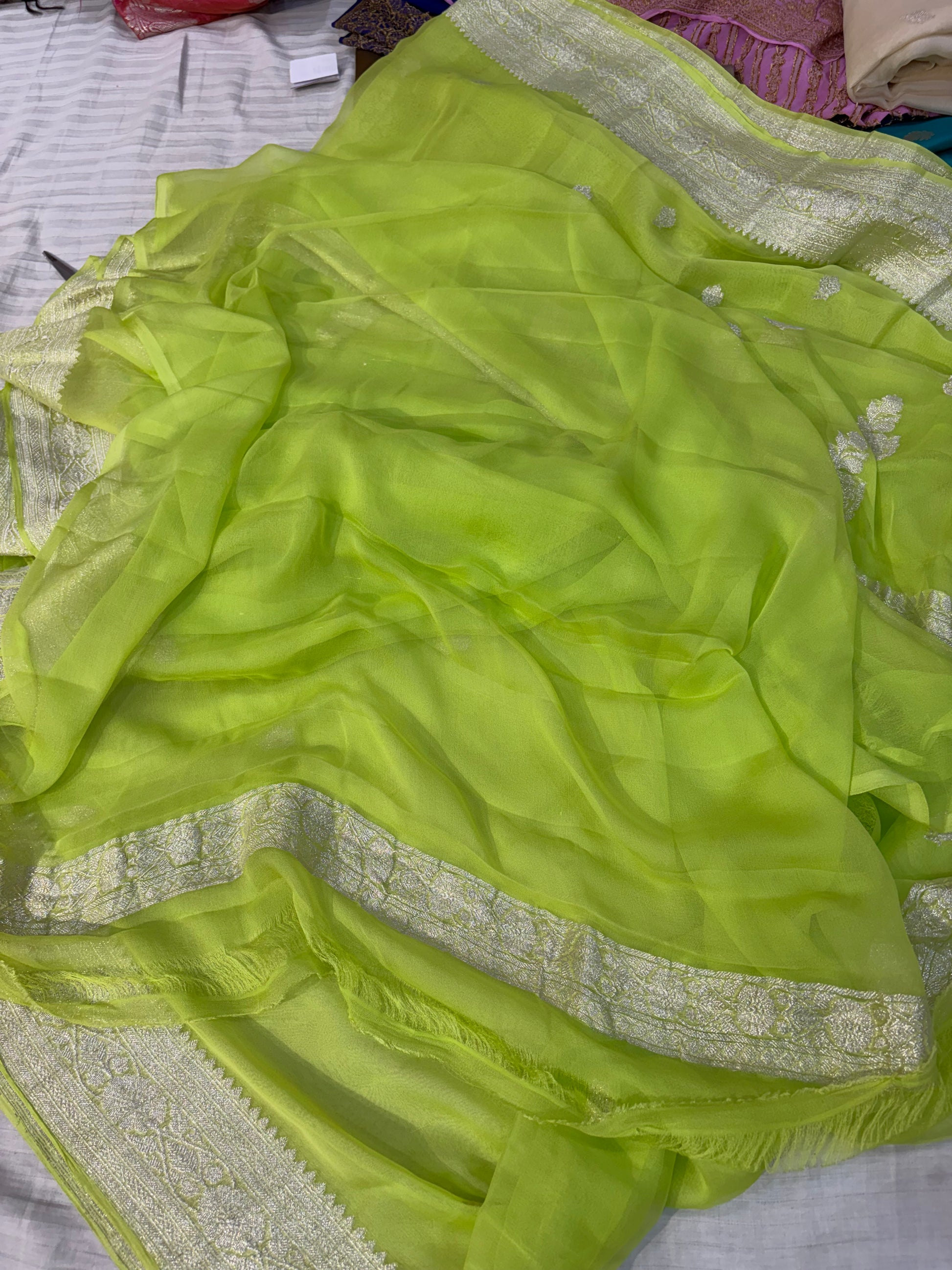Pure khaddi chiffon saree in neon green colour
