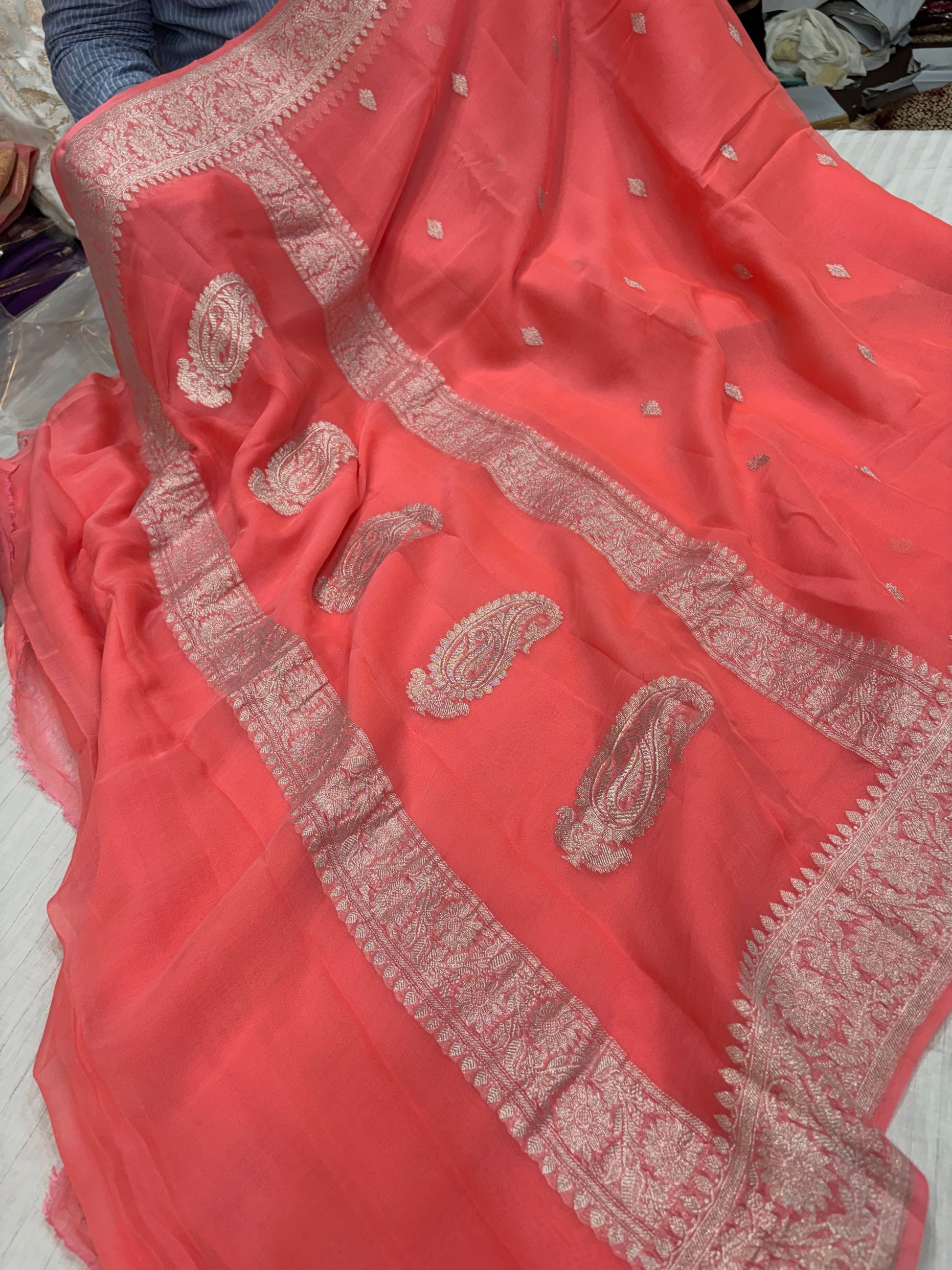 Pure khaddi chiffon saree in peach orange colour