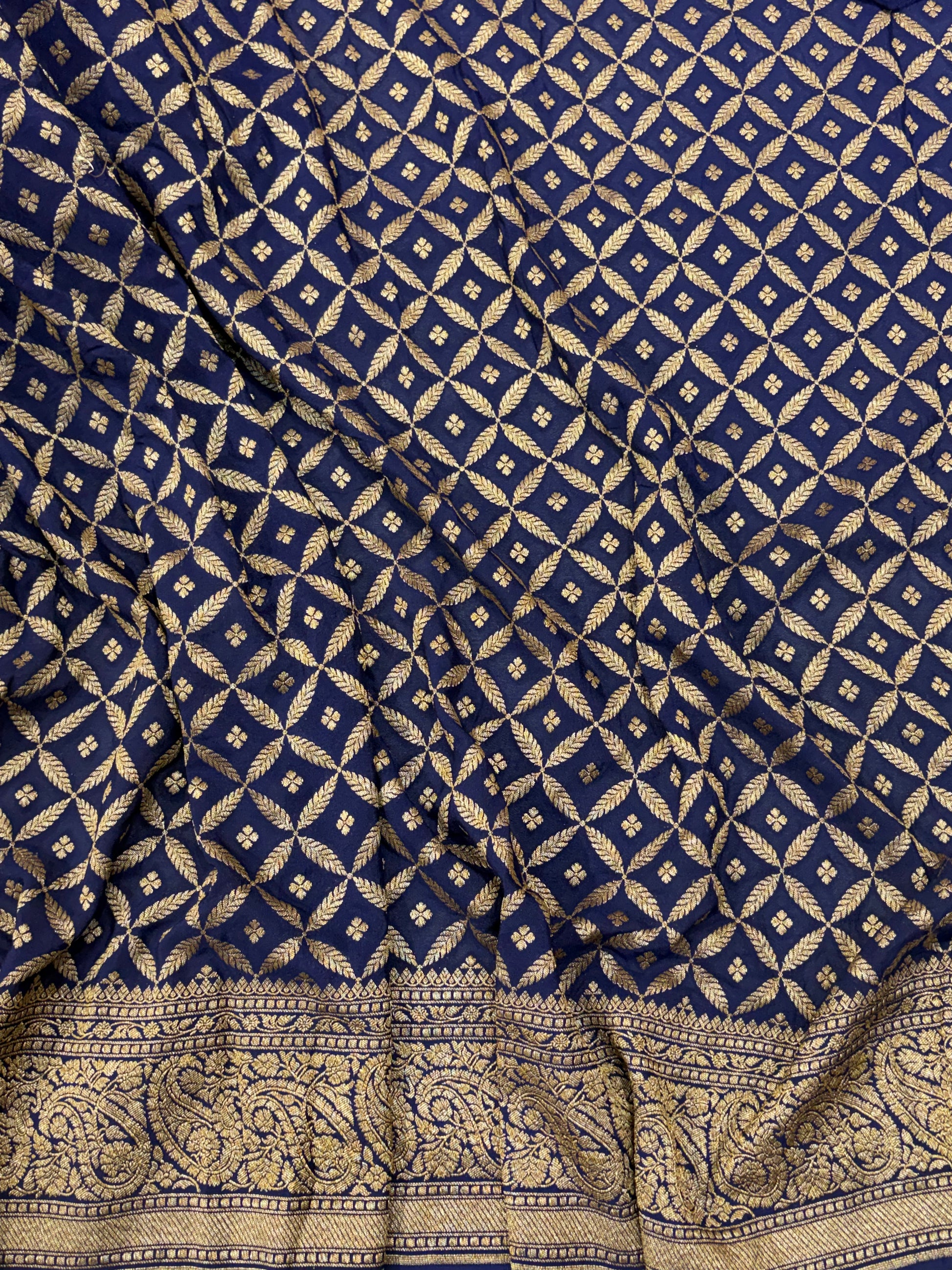 Pure khaddi crepe silk saree in mustard yellow with dark navy blue colour