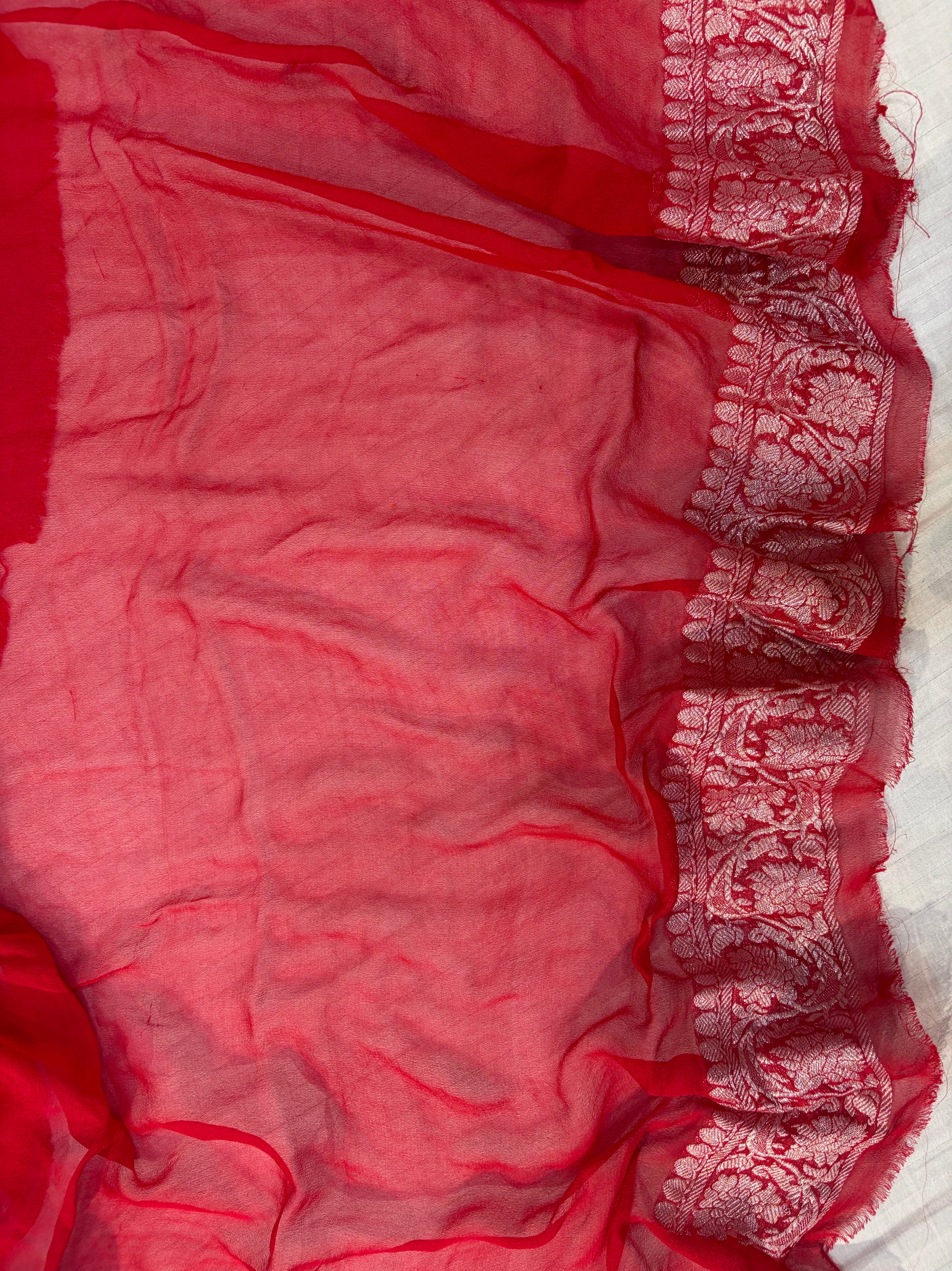 Pure khaddi chiffon saree in red colohr with all over chickenkari work