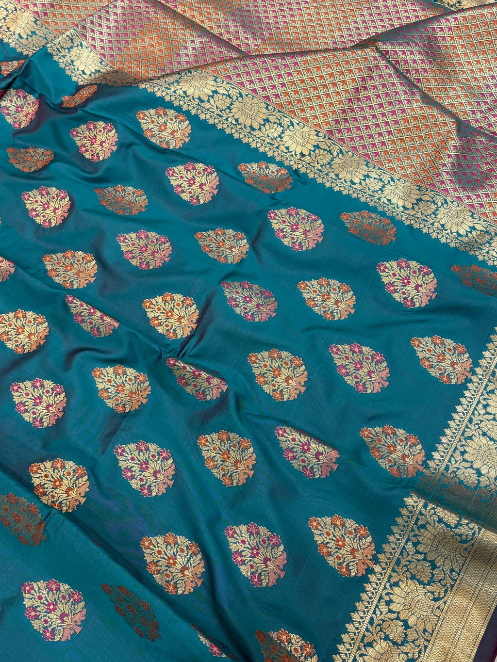 Banarasi katan by katan silk saree in Rama green colour with multiple meenakari work