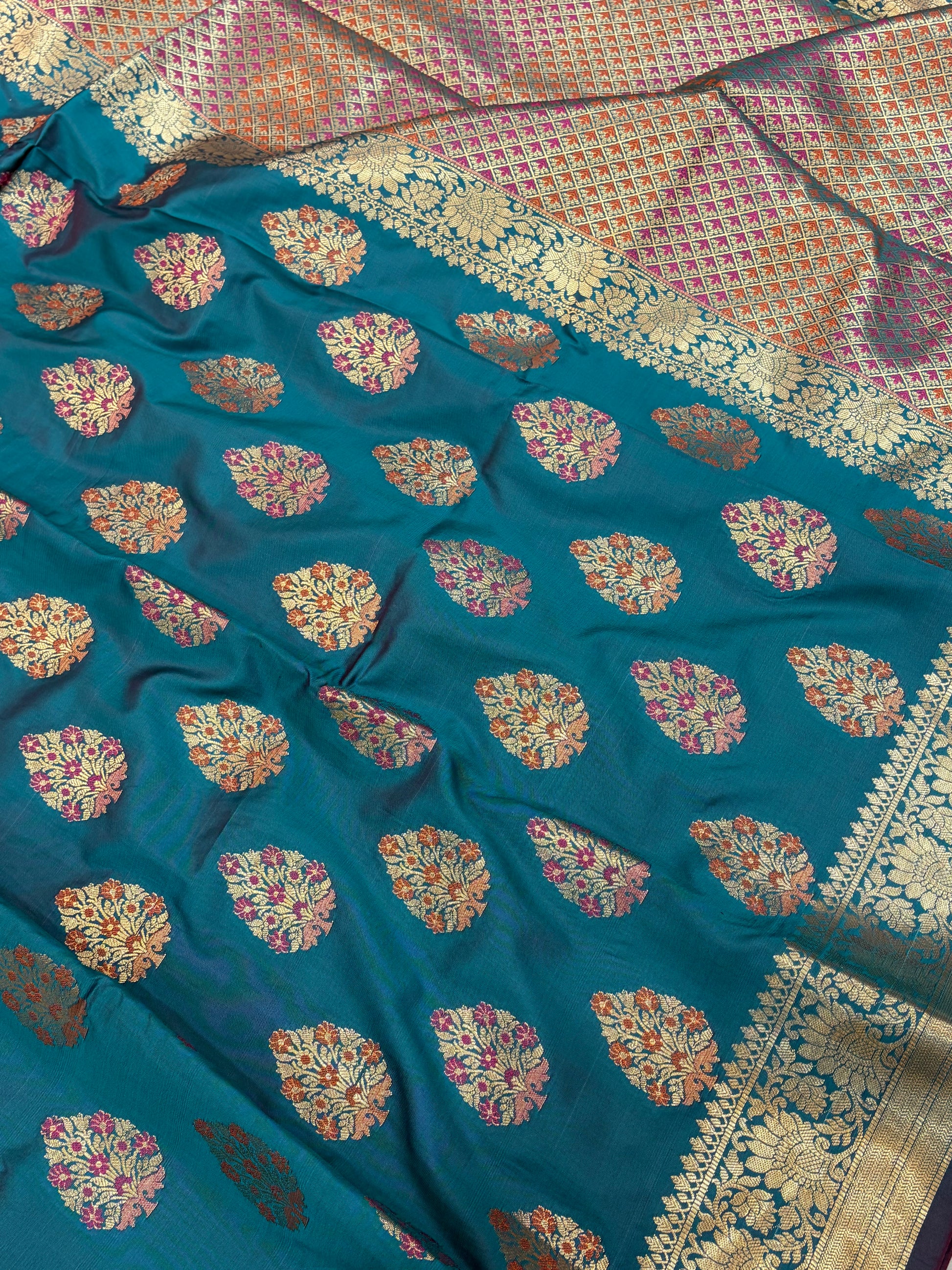 Banarasi katan by katan silk saree in Rama green colour with multiple meenakari work
