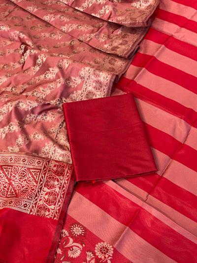 Banarasi soft silk suit in red with dusty rose colour combination with tussels