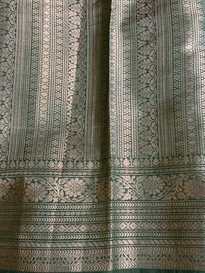 Banarasi soft katan silk saree in bottle green colour