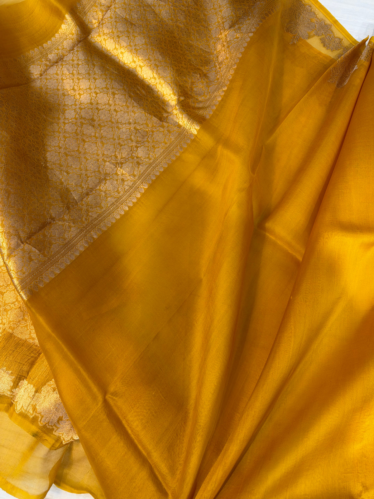 Pure handloom kora silk saree in gold yellow colour