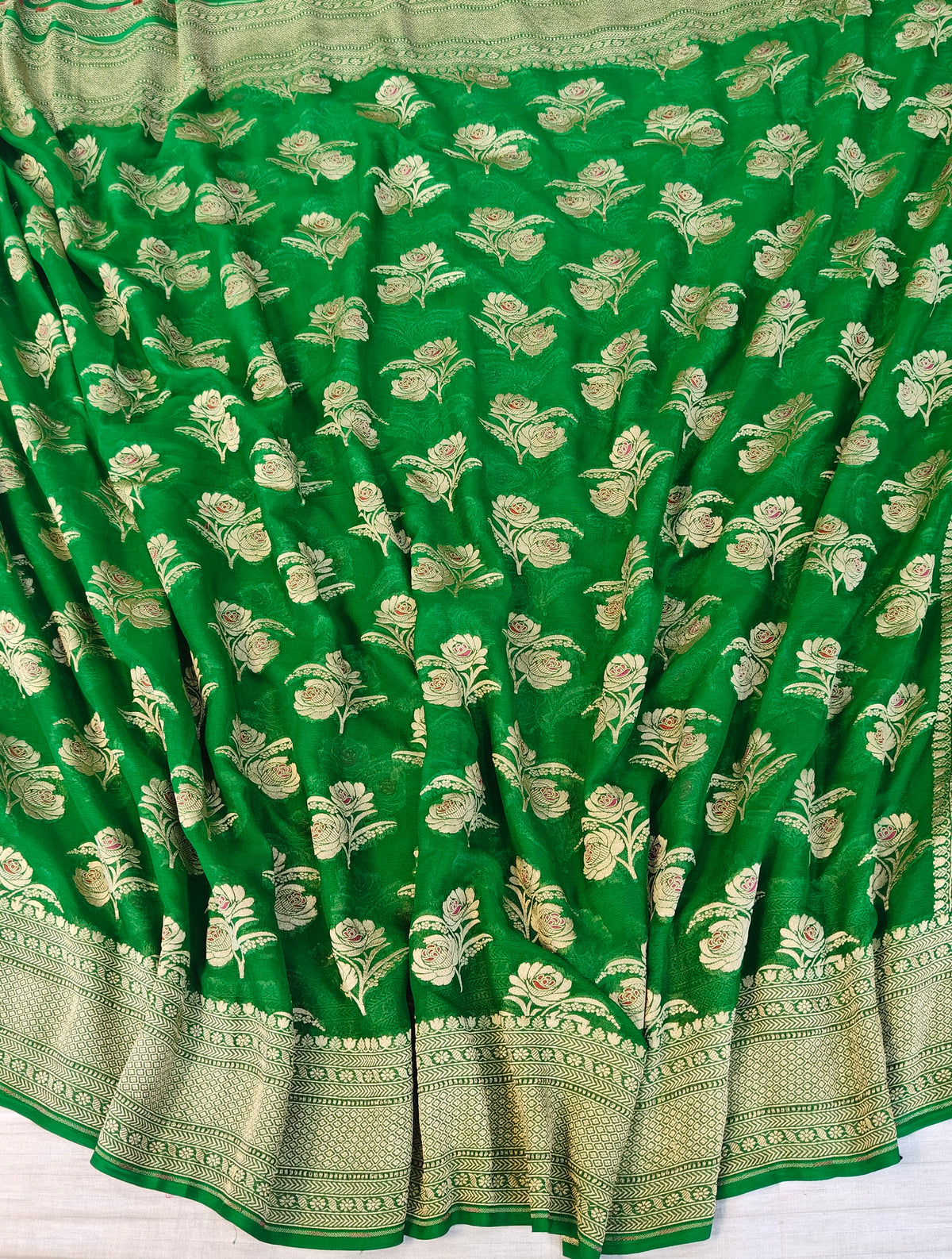 Pure georgette banarasi saree in green colour with multiple meenakari work