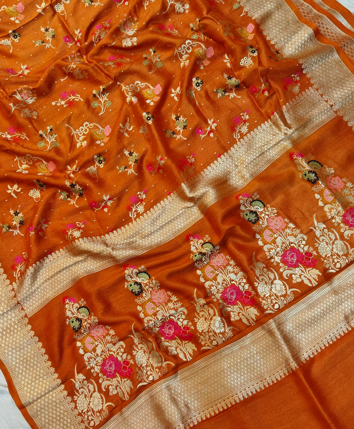 Premium pure georgette banarasi saree in rust orange colour with multiple meenakari work