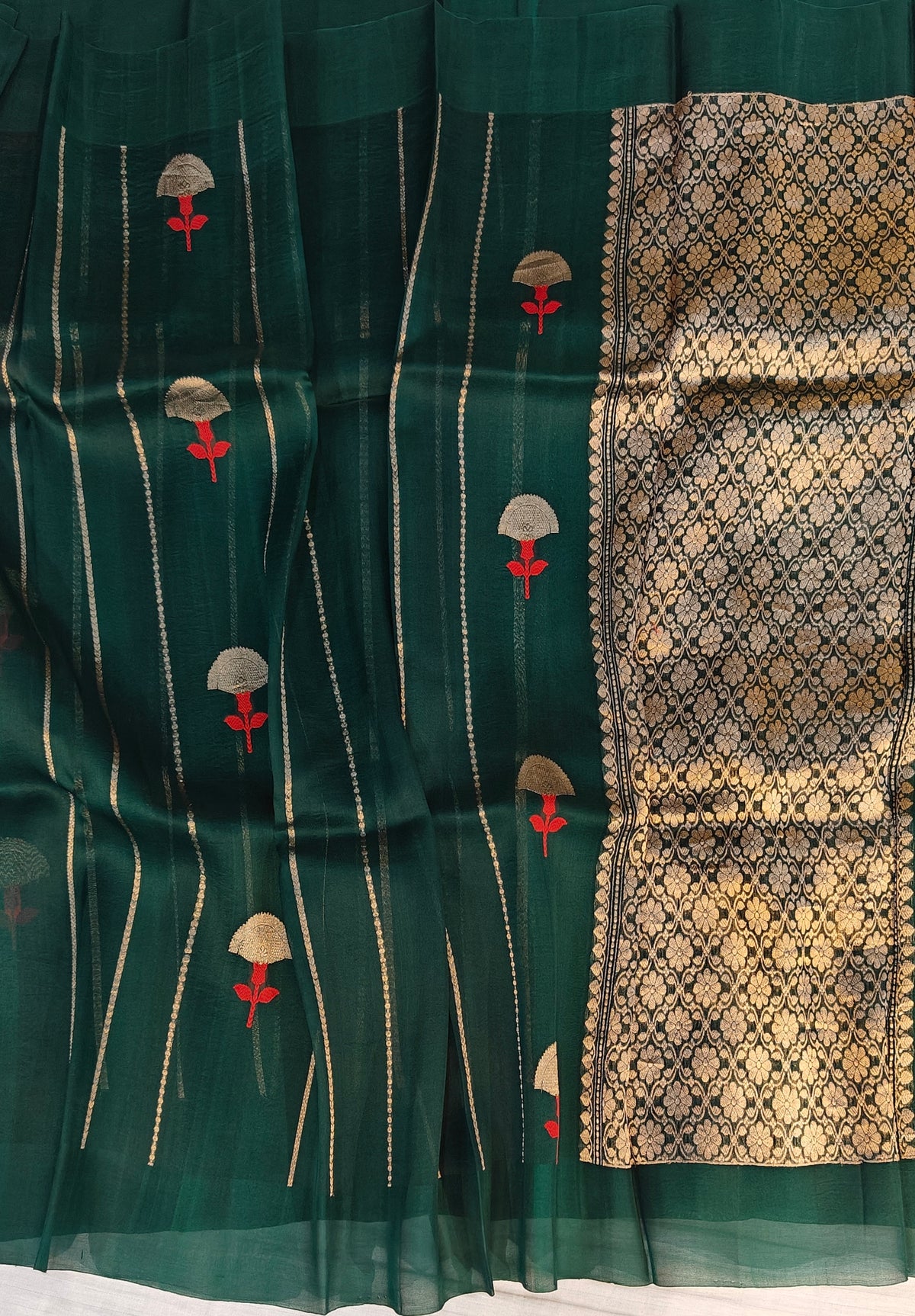 Pure handloom kora silk saree in stripes design with meenakari work in bottle green colour