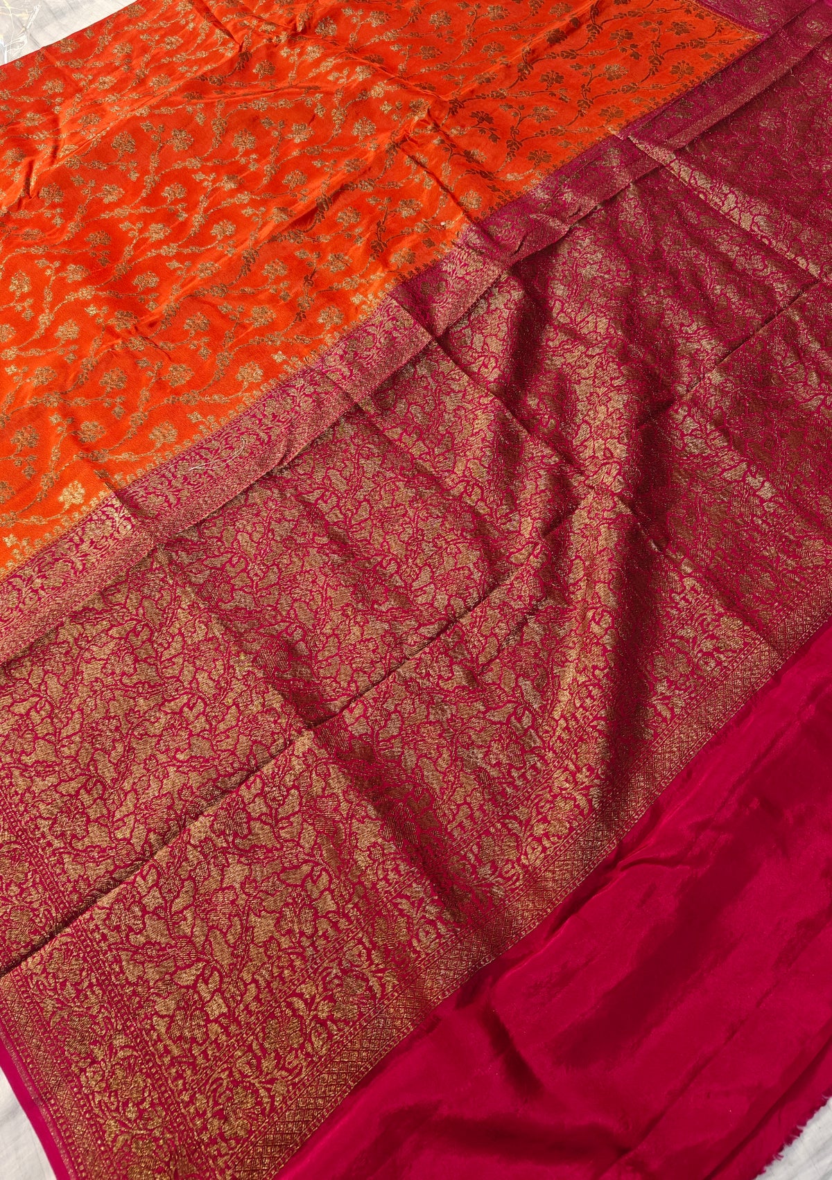 Banarasi crepe silk saree in a beautiful colour combination with soft and glossy fabric