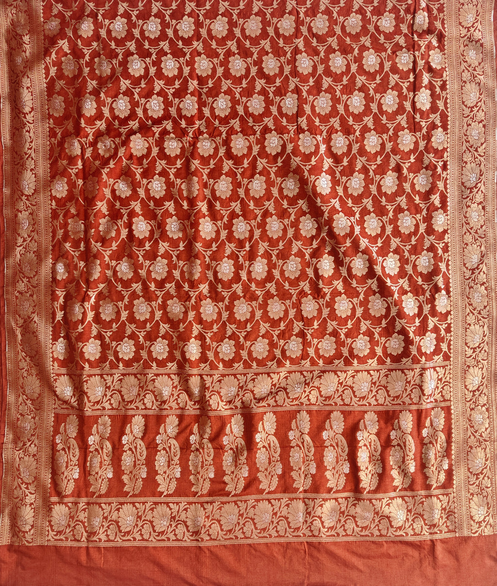 Banarasi georgette silk saree in rust orange colour with sonarupa detailing