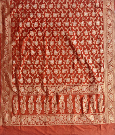 Banarasi georgette silk saree in rust orange colour with sonarupa detailing