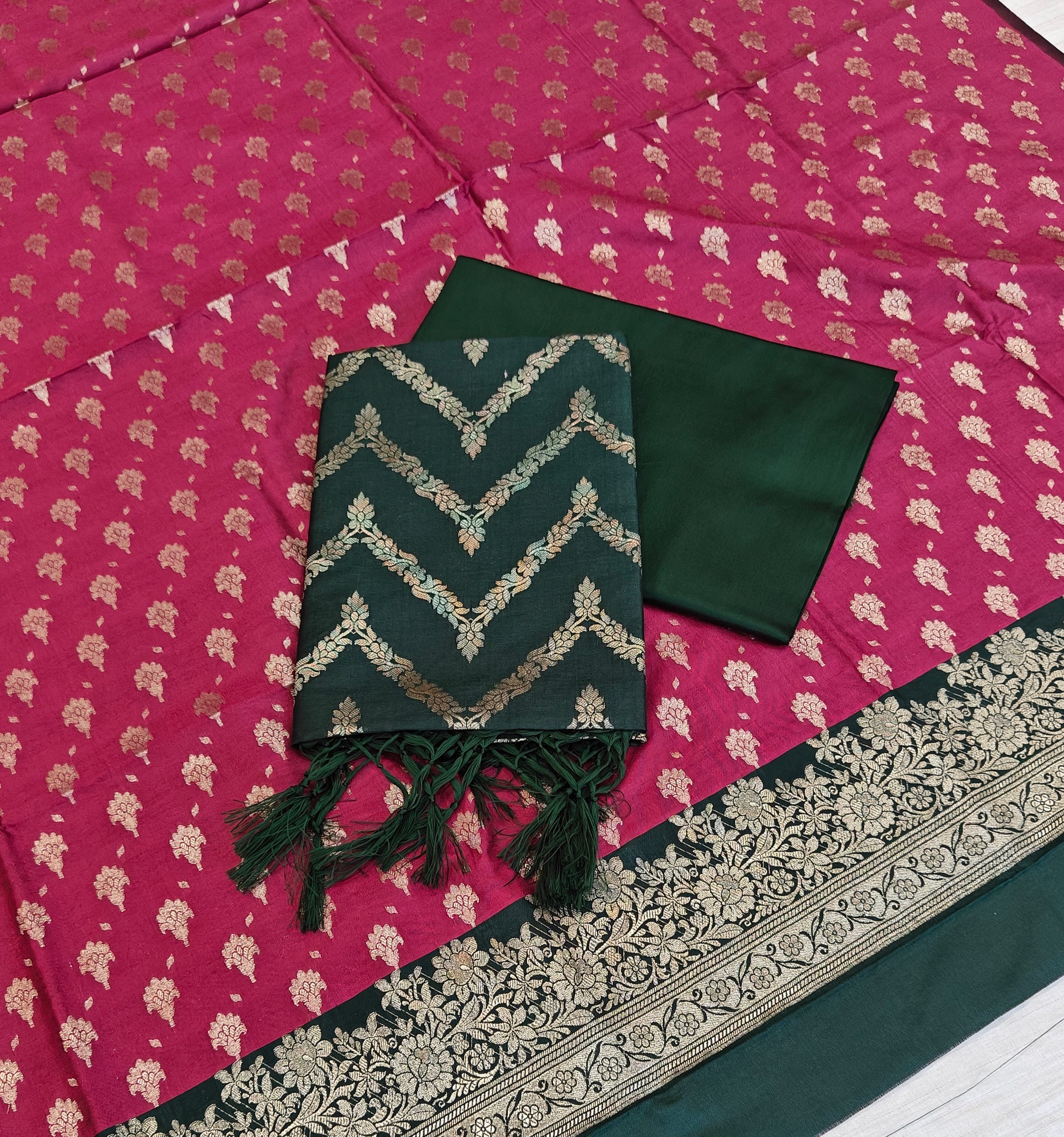 Banarasi soft silk suit in rani and bottle green colour combination