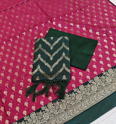 Banarasi soft silk suit in rani and bottle green colour combination