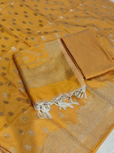 Banarasi soft silk suit in yellow colour with temple design work