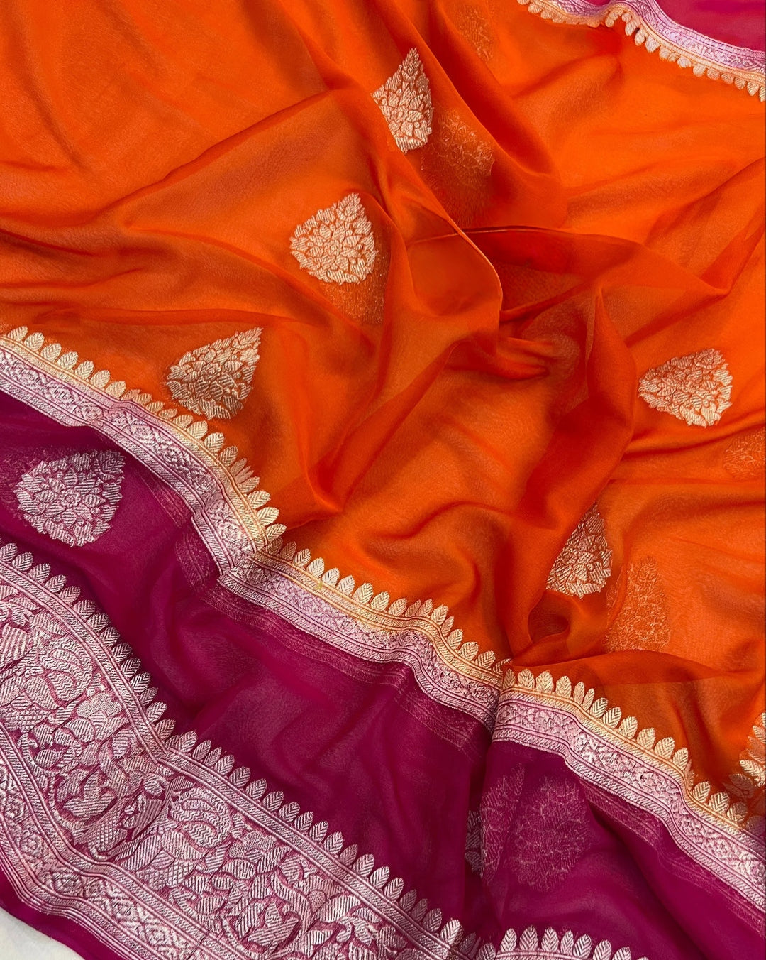 Pure georgette silk saree in temple design in a beautiful combination of orange and rani pink colour