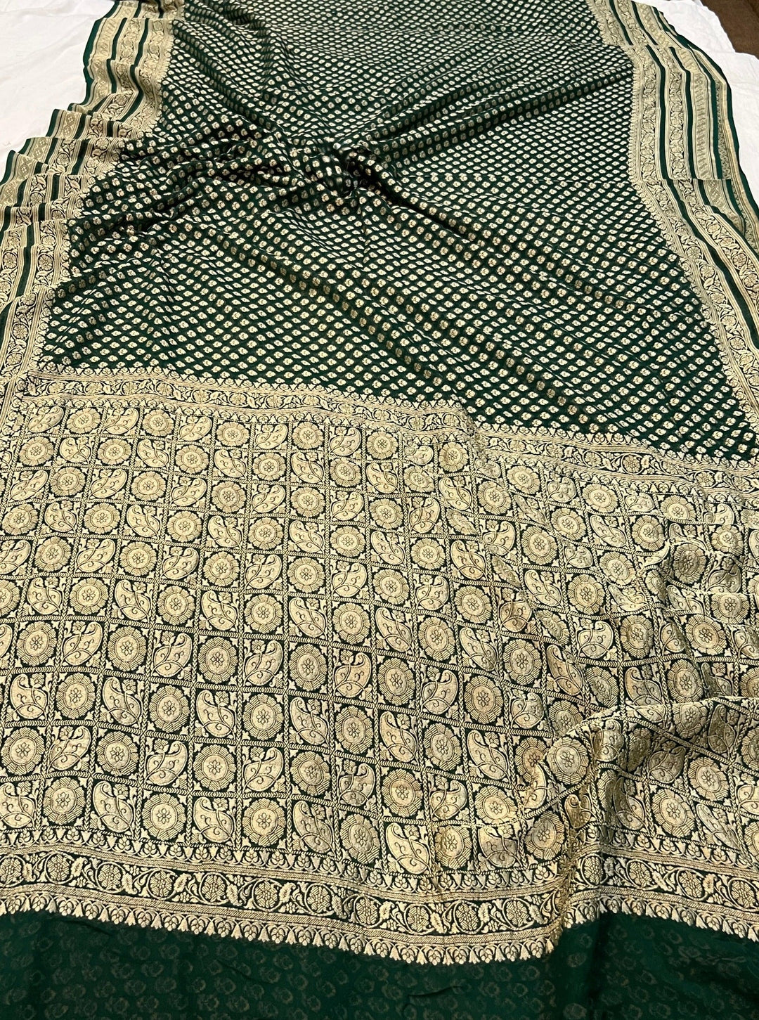 Pure georgette banarasi saree in bottle green colour with antic zari work
