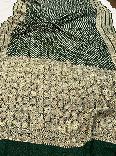 Pure georgette banarasi saree in bottle green colour with antic zari work
