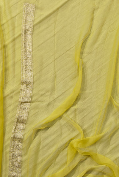 Pure khaddi chiffon saree in lemon yellow colour with all over chickenkari work
