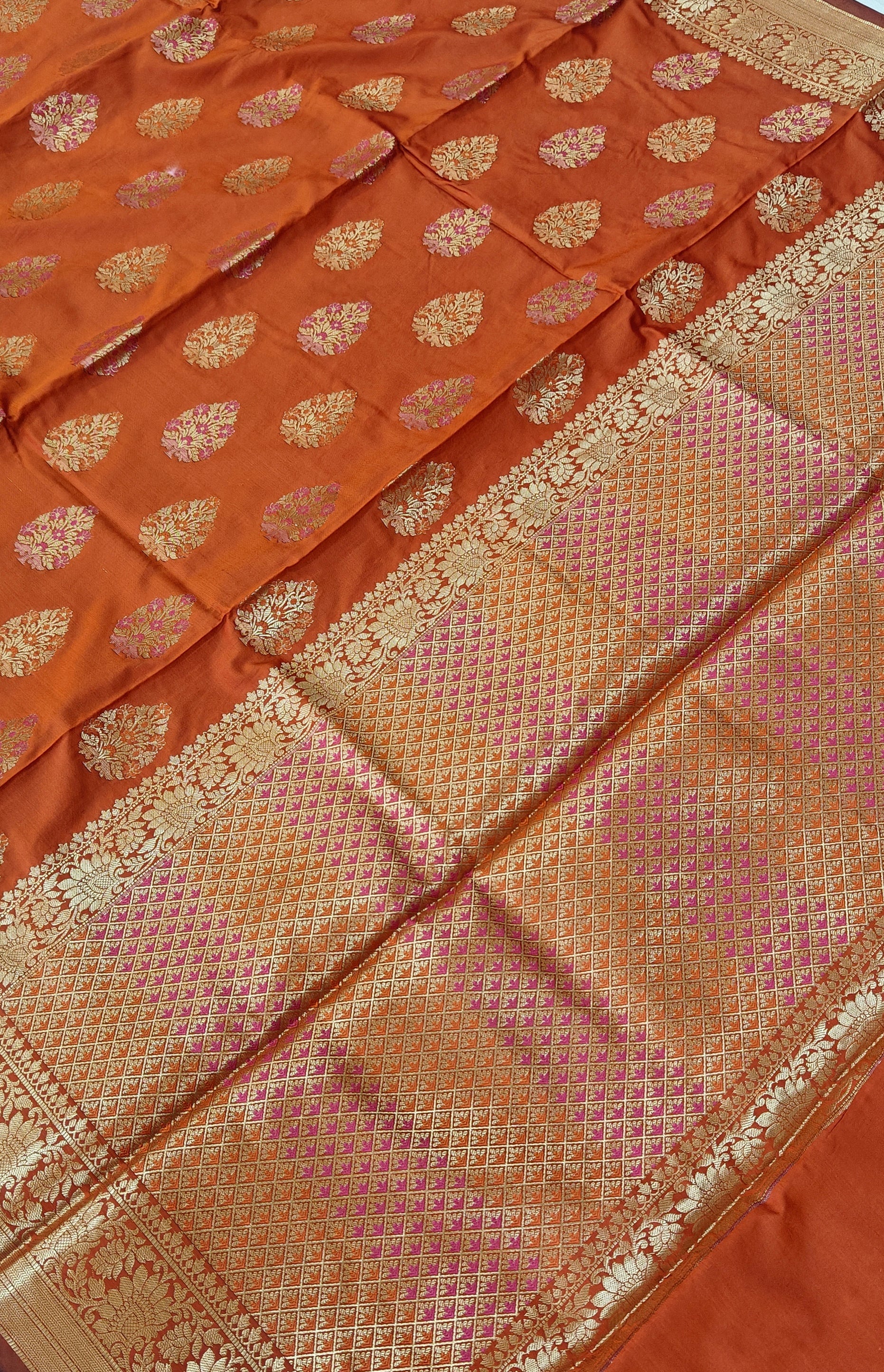 Banarasi katan by katan silk saree in orange colour with multiple meenakari work