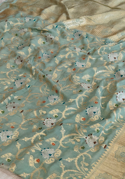Premium pure georgette banarasi saree in sea green colour with multiple meenakari work