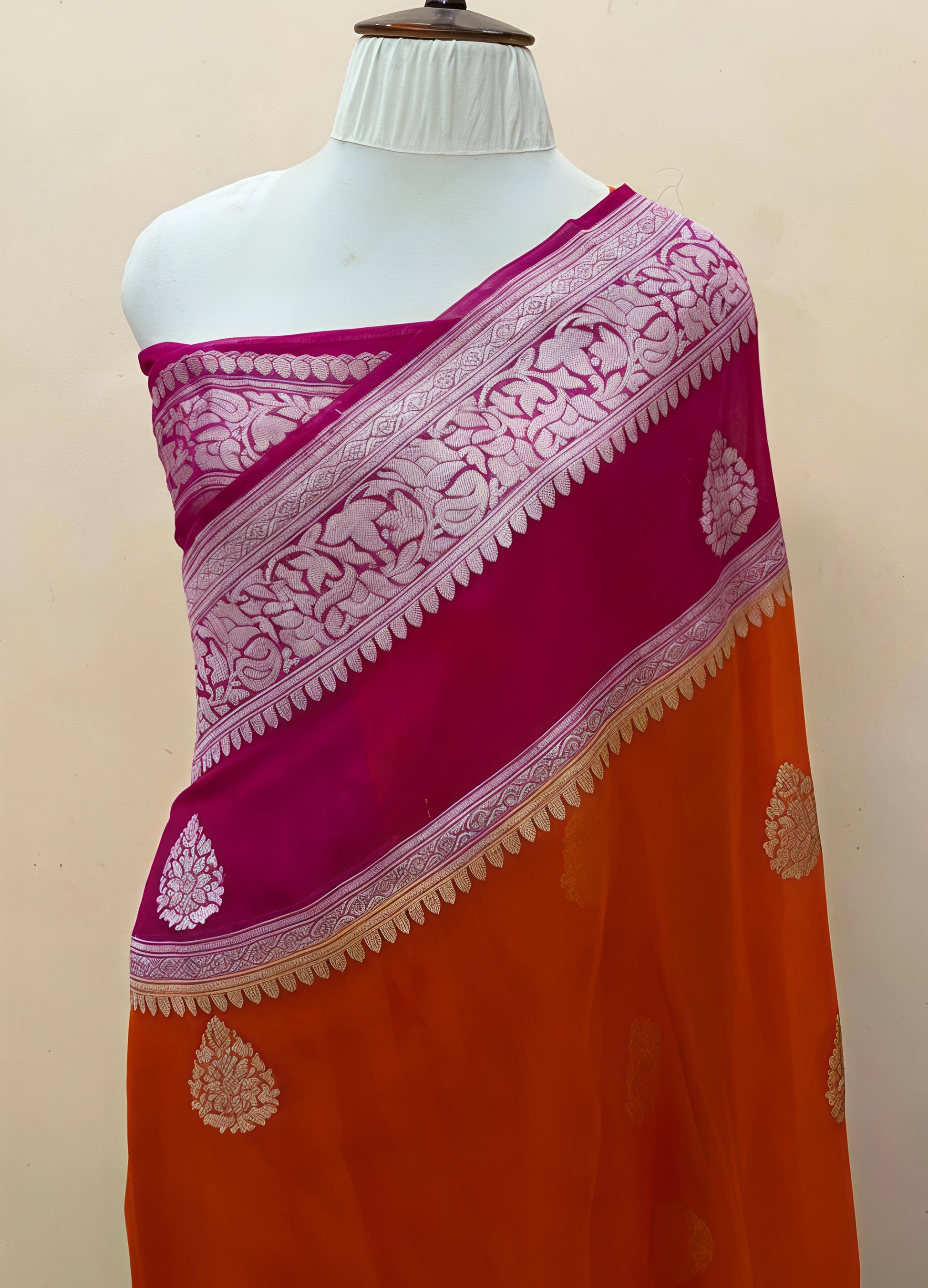 Pure georgette silk saree in temple design in a beautiful combination of orange and rani pink colour