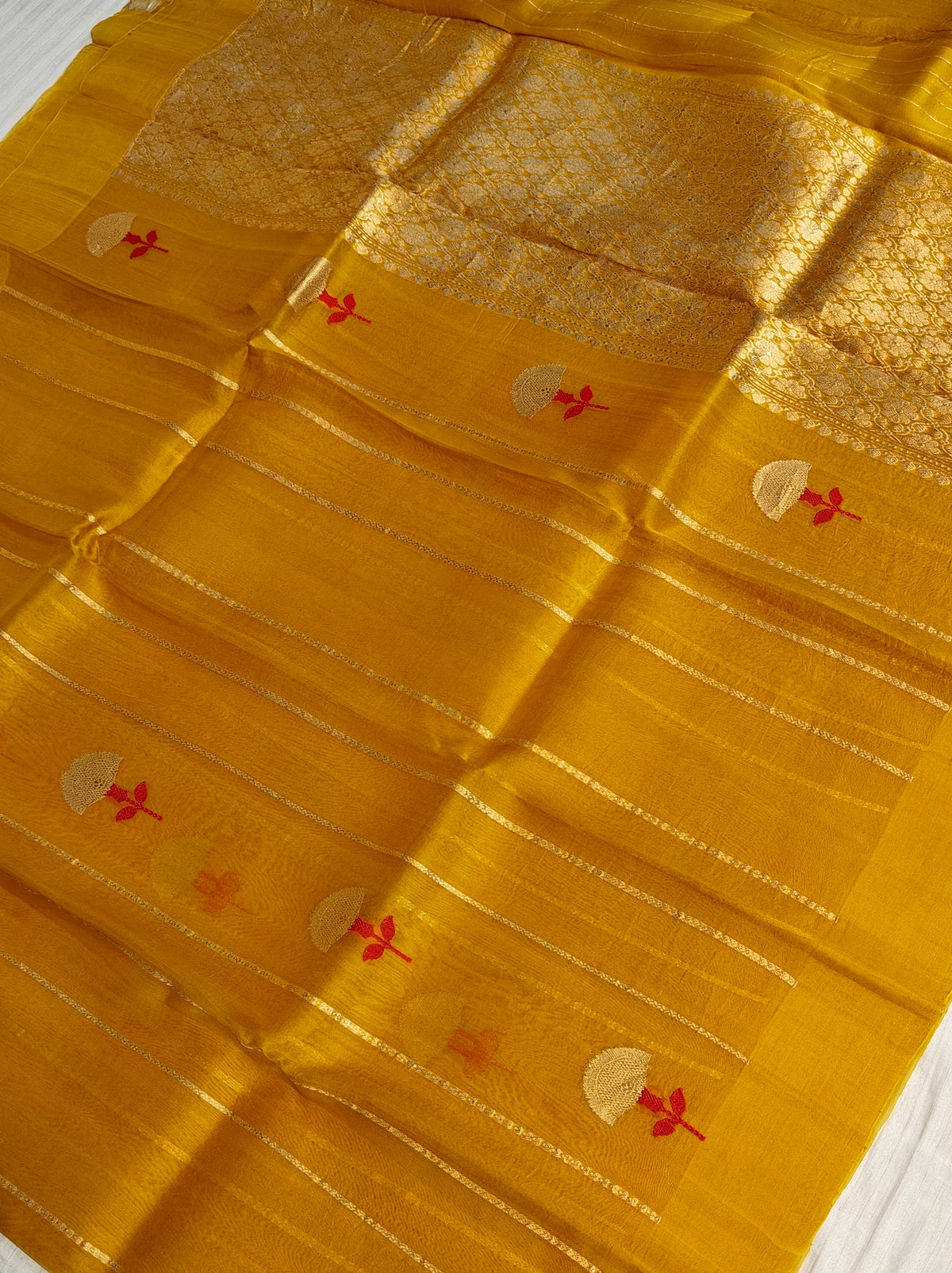 Pure handloom kora silk saree in stripes design with meenakari work in mustard colour
