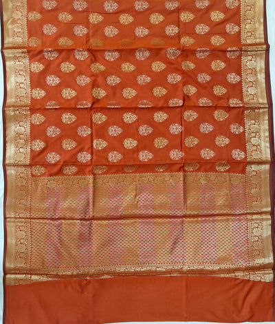 Banarasi katan by katan silk saree in orange colour with multiple meenakari work