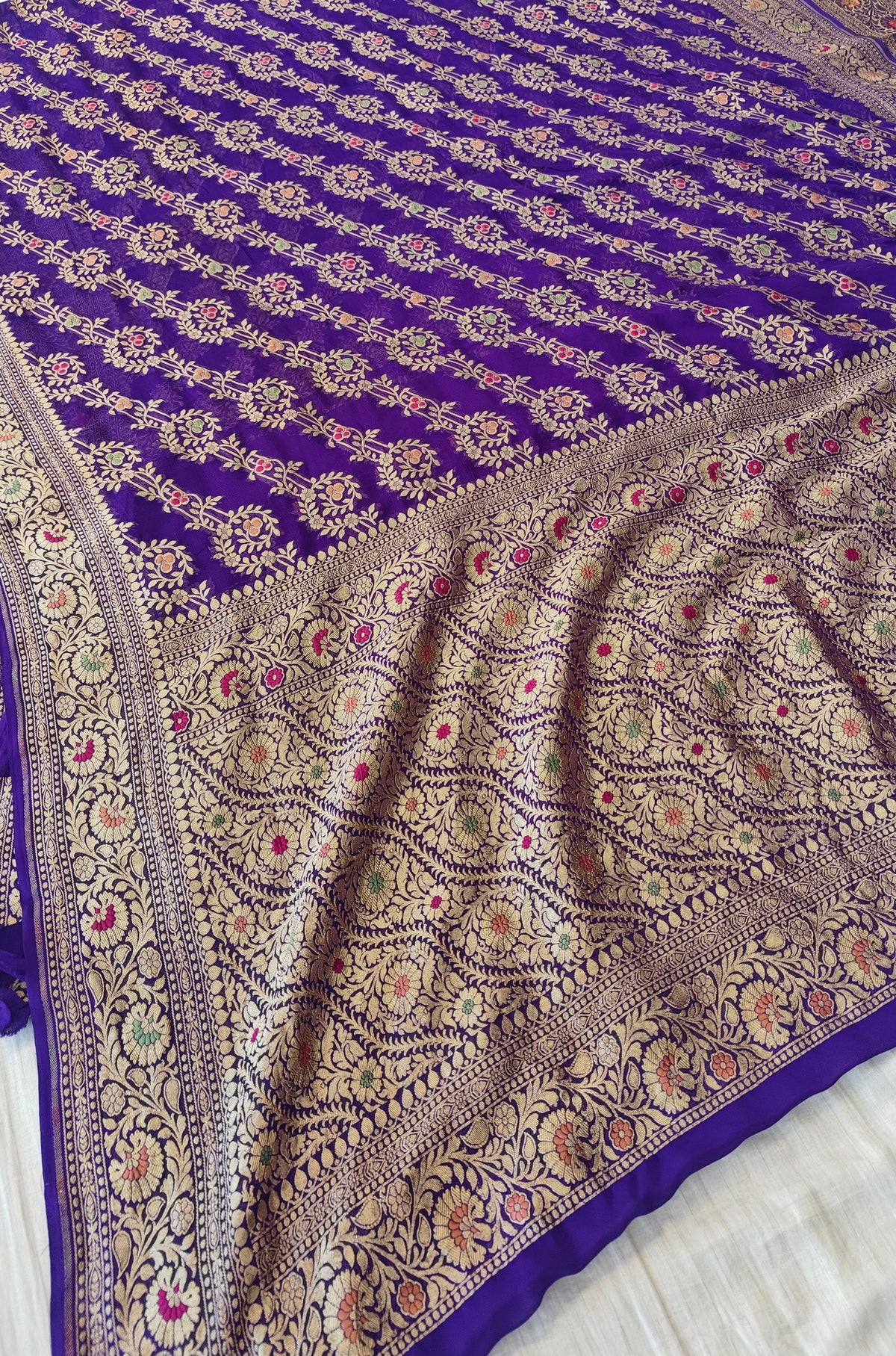 Pure georgette banarasi saree in purple colour with multiple meenakari work