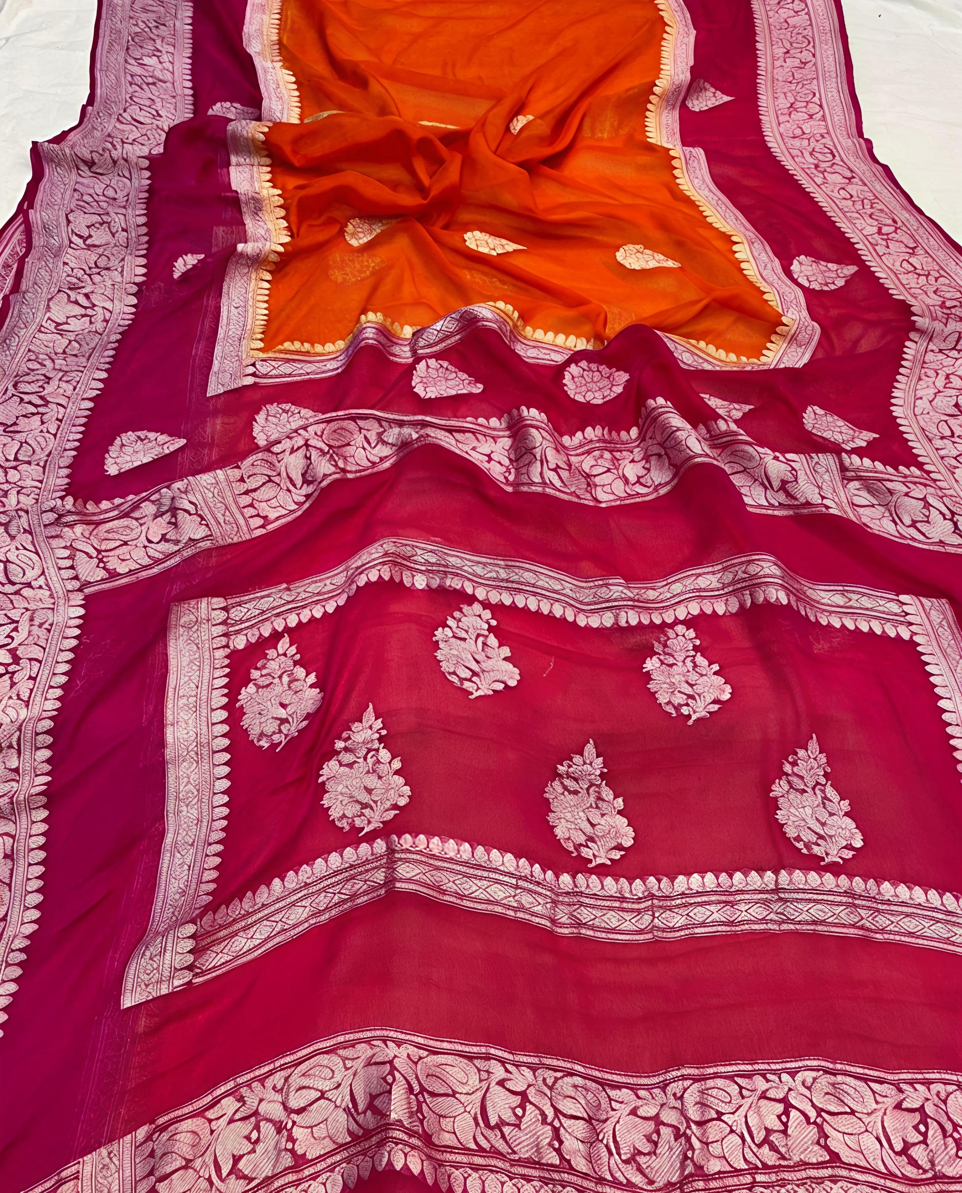 Pure georgette silk saree in temple design in a beautiful combination of orange and rani pink colour