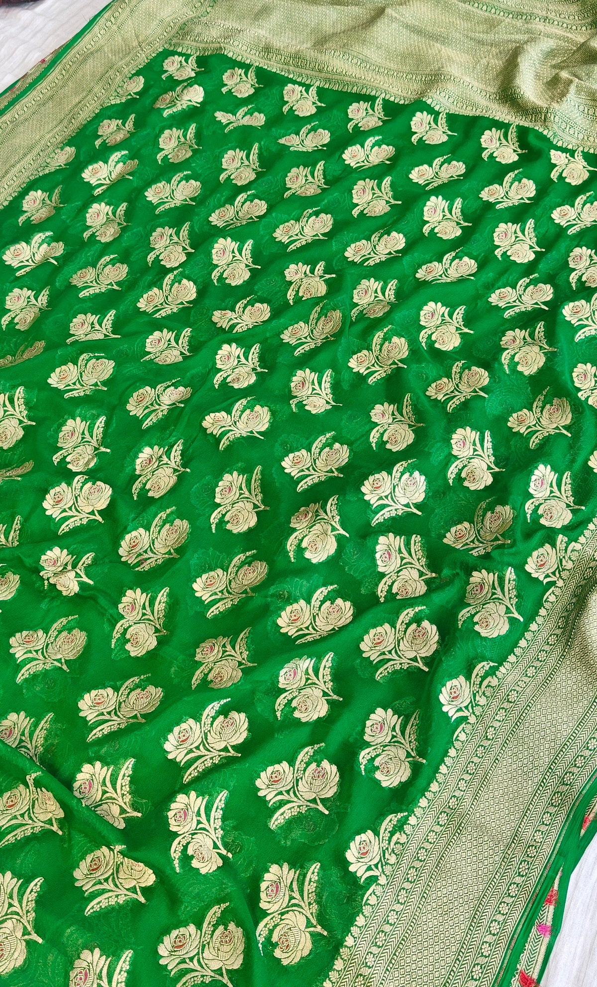 Pure georgette banarasi saree in green colour with multiple meenakari work