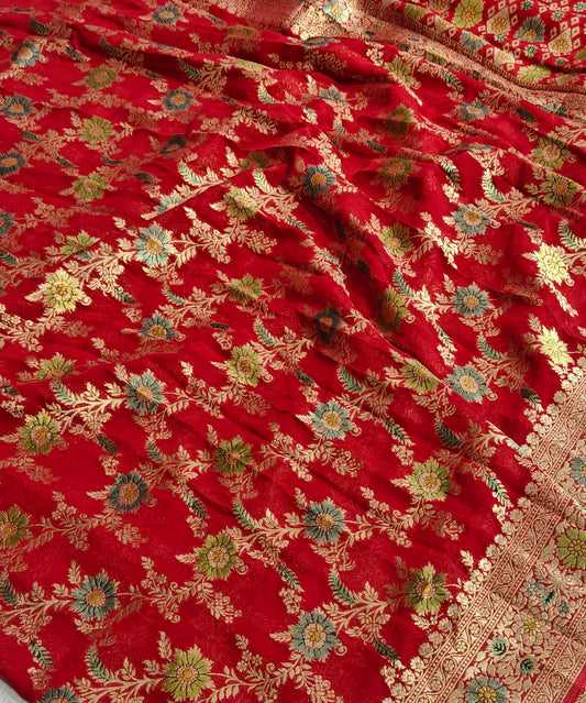 Red colour jaal georgette silk Banarasi saree with multiple meenakari work