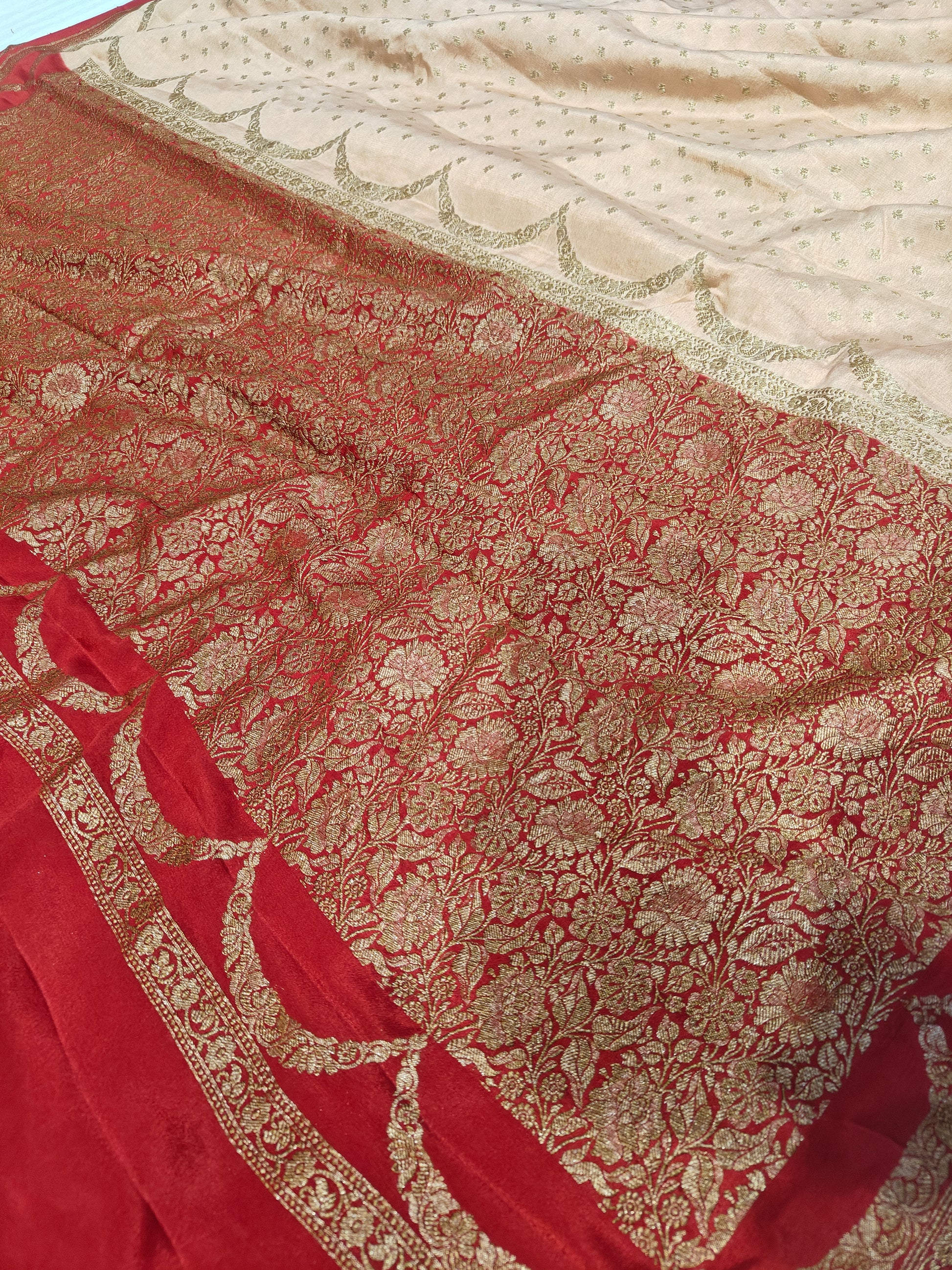 Pure khaddi crepe silk saree laheriya border design with monopoly blouse piece design in off white with blood red