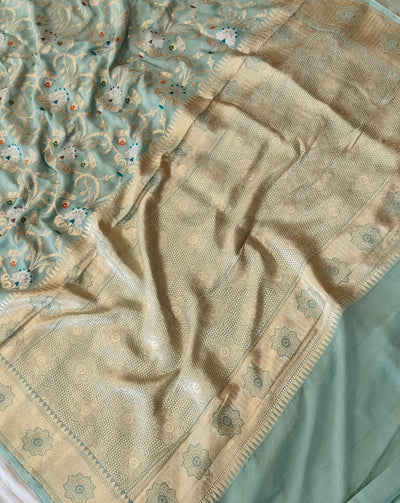 Premium pure georgette banarasi saree in sea green colour with multiple meenakari work