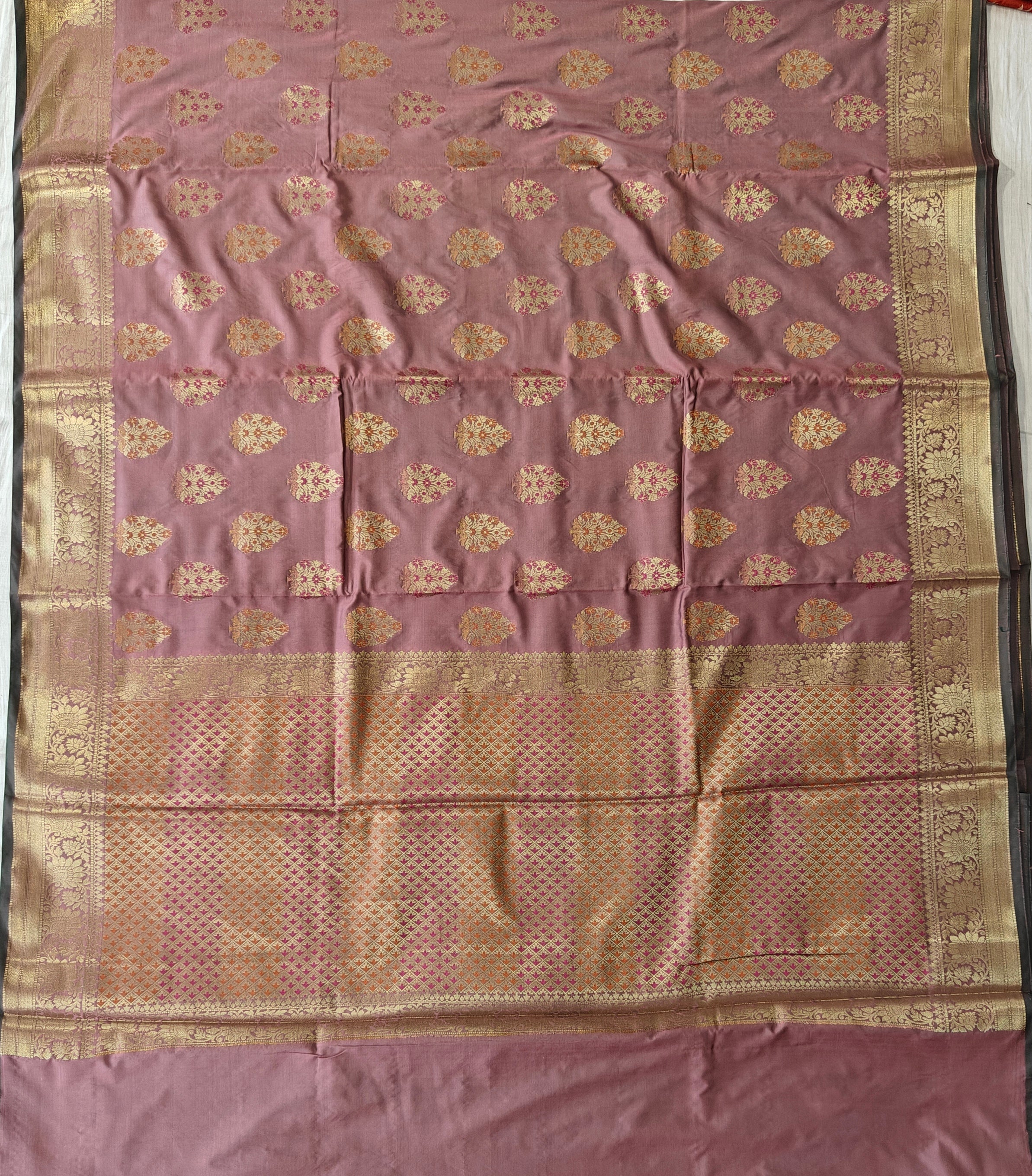 Banarasi katan by katan silk saree in duskyrose colour with multiple meenakari work