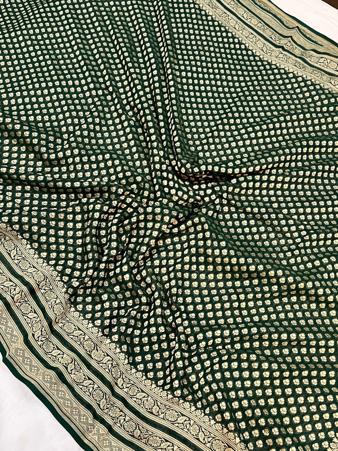 Pure georgette banarasi saree in bottle green colour with antic zari work