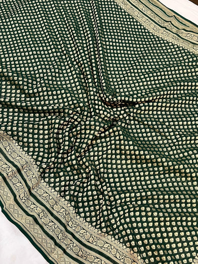 Pure georgette banarasi saree in bottle green colour with antic zari work
