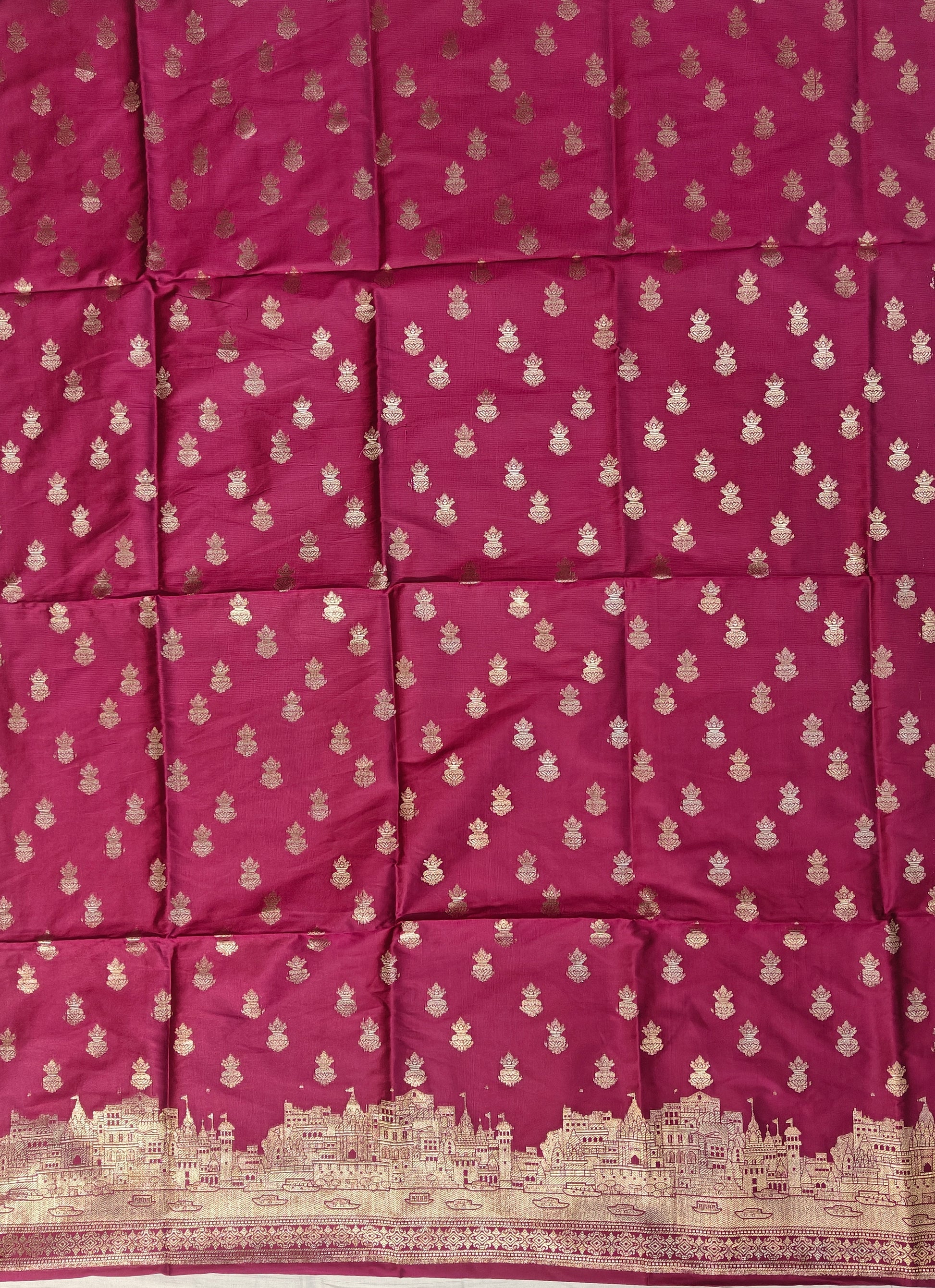 Banarasi soft silk suit in rani colour with temple design work