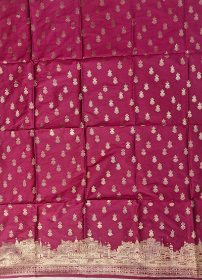 Banarasi soft silk suit in rani colour with temple design work