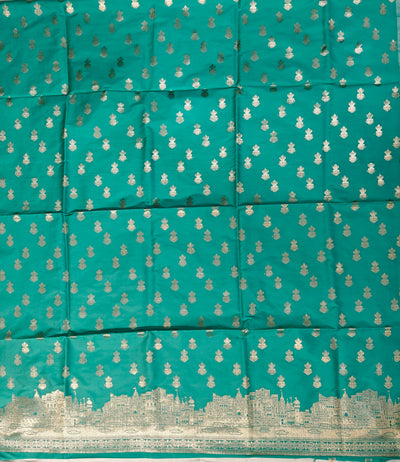 Banarasi soft silk suit in rama colour with temple design work
